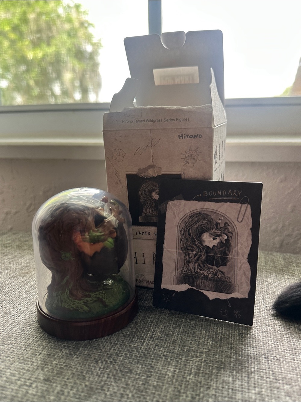 Hikono Brown & Green Collectible Figure with Display Dome